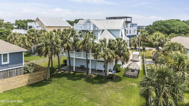 209 Georgia Ave, Carolina Beach, NC 28428 - back of property featuring a patio and a balcony