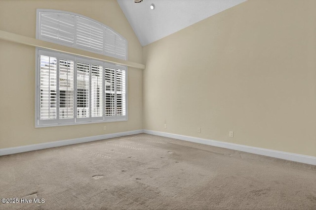 205 S Grist Mill Rd, Hampstead, NC 28443 - spare room with carpet flooring, high vaulted ceiling, and baseboards
