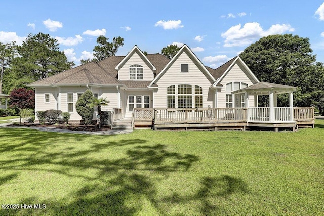 205 S Grist Mill Rd, Hampstead, NC 28443 - rear view of house featuring a gazebo, a yard, and a deck