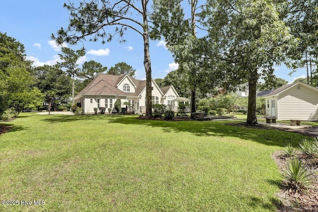 205 S Grist Mill Rd, Hampstead, NC 28443 - view of front of house with a front lawn