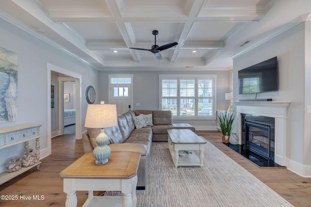 232 Trawlers Way, Wilmington, NC 28412 - living area with a ceiling fan, a fireplace with flush hearth, wood finished floors, beam ceiling, and baseboards