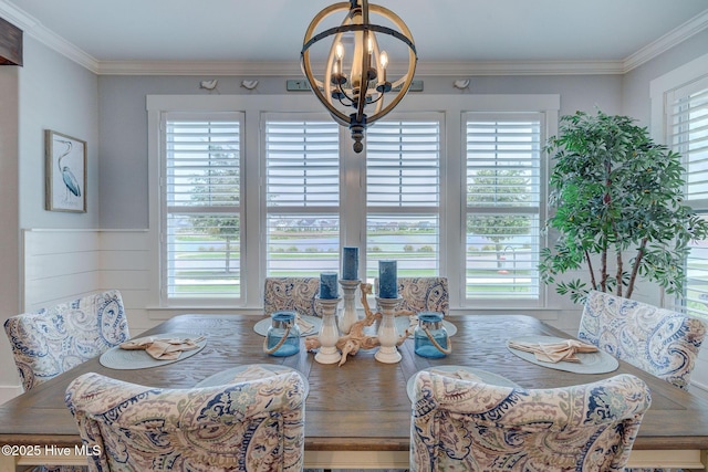 232 Trawlers Way, Wilmington, NC 28412 - dining room featuring a chandelier and ornamental molding