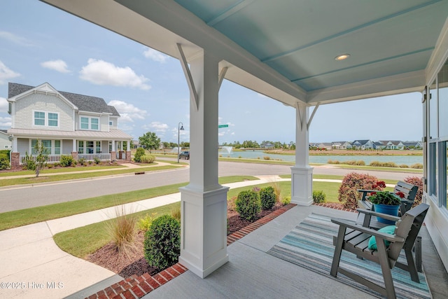 232 Trawlers Way, Wilmington, NC 28412 - porch featuring a water view