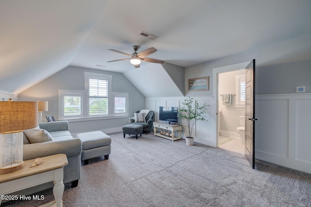 232 Trawlers Way, Wilmington, NC 28412 - living area featuring a ceiling fan, carpet floors, lofted ceiling, and a wainscoted wall