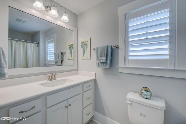 232 Trawlers Way, Wilmington, NC 28412 - bathroom with toilet, vanity, and baseboards