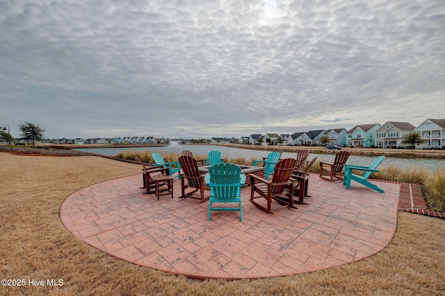232 Trawlers Way, Wilmington, NC 28412 - view of patio with an outdoor fire pit, a residential view, and a water view