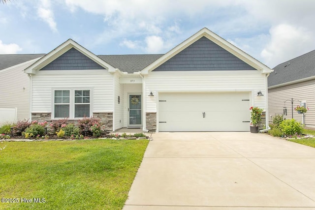 873 Bourne Dr SW, Ocean Isle Beach, NC 28469 - craftsman-style home with driveway, a front lawn, an attached garage, and stone siding