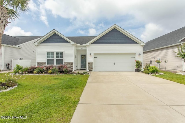 873 Bourne Dr SW, Ocean Isle Beach, NC 28469 - craftsman inspired home featuring a garage, concrete driveway, a front lawn, and stone siding