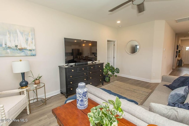 873 Bourne Dr SW, Ocean Isle Beach, NC 28469 - living room featuring wood finished floors, baseboards, ceiling fan, and recessed lighting