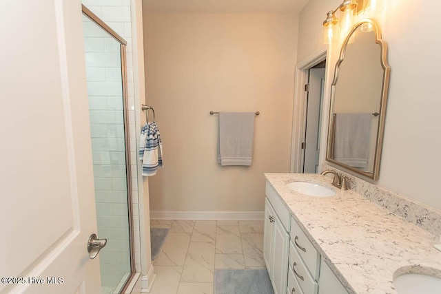 873 Bourne Dr SW, Ocean Isle Beach, NC 28469 - full bathroom featuring marble finish flooring, double vanity, a tile shower, and baseboards