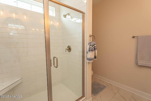 873 Bourne Dr SW, Ocean Isle Beach, NC 28469 - full bathroom with toilet, a shower stall, baseboards, and marble finish flooring