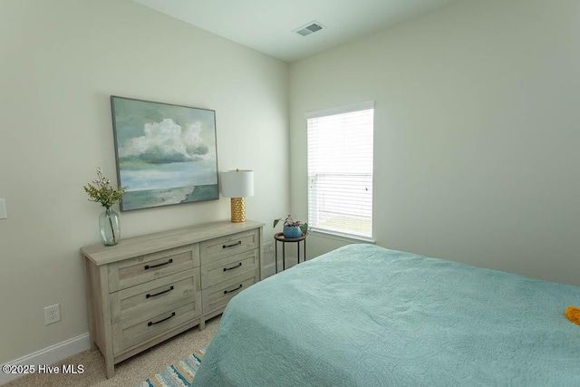 873 Bourne Dr SW, Ocean Isle Beach, NC 28469 - bedroom with light colored carpet and baseboards