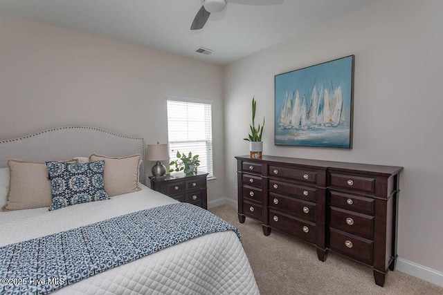 873 Bourne Dr SW, Ocean Isle Beach, NC 28469 - bedroom with light colored carpet, baseboards, and a ceiling fan