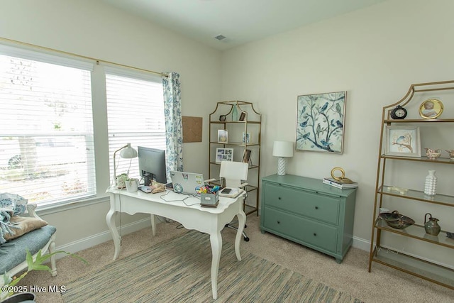 873 Bourne Dr SW, Ocean Isle Beach, NC 28469 - office area with light colored carpet, plenty of natural light, and baseboards