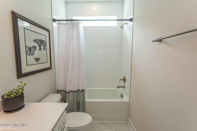 873 Bourne Dr SW, Ocean Isle Beach, NC 28469 - full bathroom featuring toilet, marble look tile flooring, shower / bath combination with curtain, vanity, and baseboards