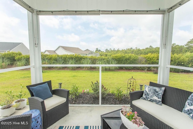 873 Bourne Dr SW, Ocean Isle Beach, NC 28469 - sunroom with healthy amount of natural light and outdoor lounge area