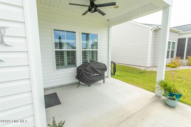 873 Bourne Dr SW, Ocean Isle Beach, NC 28469 - view of patio / terrace featuring a ceiling fan and grilling area