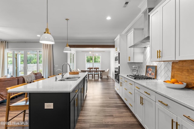 386 Yucca Ln, Wilmington, NC 28412 - kitchen with a sink, a kitchen bar, stainless steel appliances, recessed lighting, and decorative backsplash