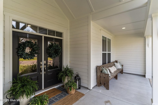 386 Yucca Ln, Wilmington, NC 28412 - entrance to property featuring covered porch and french doors