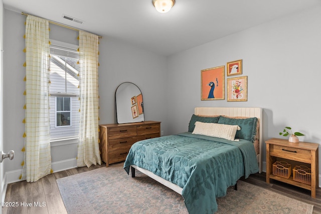 386 Yucca Ln, Wilmington, NC 28412 - bedroom featuring wood finished floors and baseboards