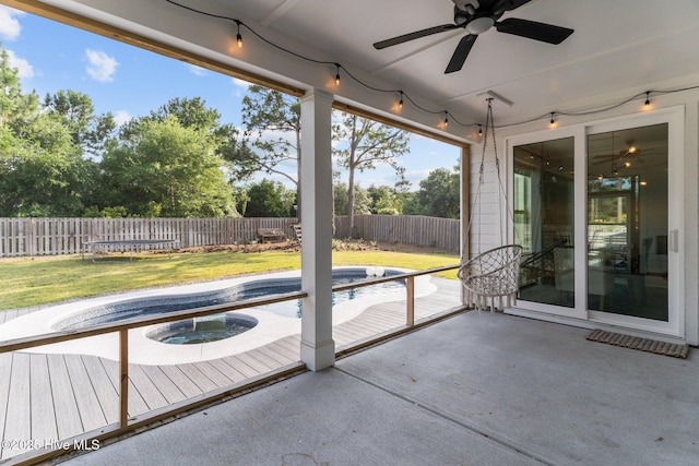 386 Yucca Ln, Wilmington, NC 28412 - unfurnished sunroom with a jacuzzi and ceiling fan