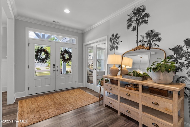 386 Yucca Ln, Wilmington, NC 28412 - foyer entrance with french doors, ornamental molding, wood finished floors, and baseboards