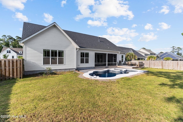 386 Yucca Ln, Wilmington, NC 28412 - back of house with a sunroom, a shingled roof, and a patio area