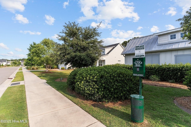 386 Yucca Ln, Wilmington, NC 28412 - view of property's community with a yard