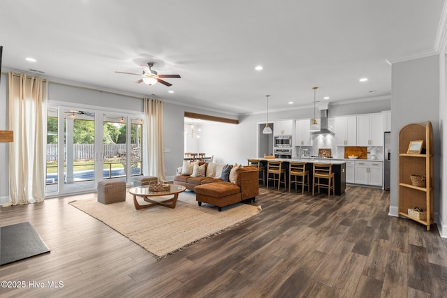 386 Yucca Ln, Wilmington, NC 28412 - living area with crown molding, ceiling fan, dark wood finished floors, recessed lighting, and baseboards
