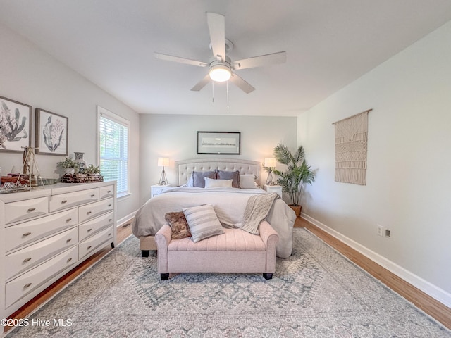 109 Bellowing Doe Rd, Hampstead, NC 28443 - bedroom featuring wood finished floors, baseboards, and a ceiling fan
