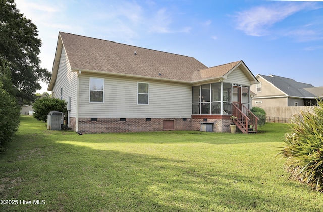 109 Bellowing Doe Rd, Hampstead, NC 28443 - back of property with a sunroom, crawl space, central AC, and a shingled roof