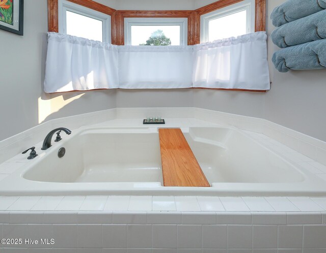813 Puddin Ridge Rd, Moyock, NC 27958 - bathroom featuring a garden tub