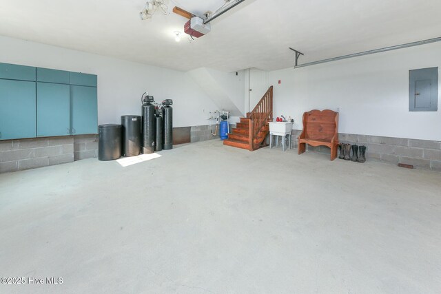 813 Puddin Ridge Rd, Moyock, NC 27958 - garage with electric panel and a garage door opener