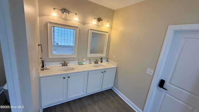 308 E Dolphin Vw, Sneads Ferry, NC 28460 - full bathroom featuring double vanity, wood finished floors, and baseboards