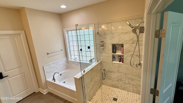 308 E Dolphin Vw, Sneads Ferry, NC 28460 - full bath featuring a bath, a shower stall, recessed lighting, and wood finished floors