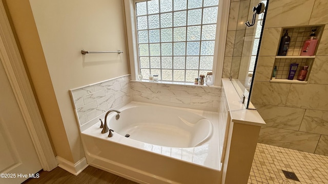 308 E Dolphin Vw, Sneads Ferry, NC 28460 - bathroom featuring a garden tub and a tile shower