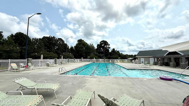 308 E Dolphin Vw, Sneads Ferry, NC 28460 - community pool featuring a patio area