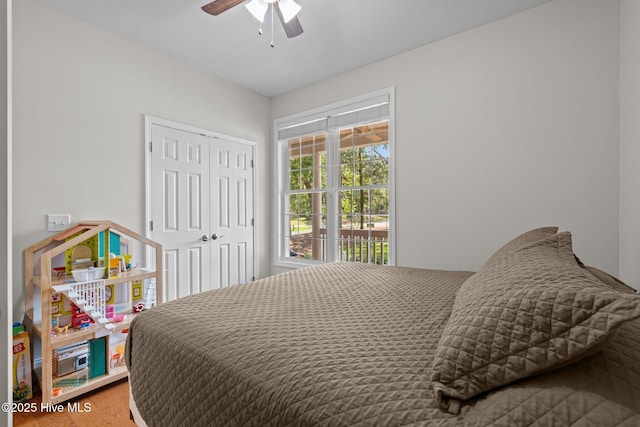 103 Sandspur Ln, West End, NC 27376 - bedroom with a closet, wood finished floors, and ceiling fan