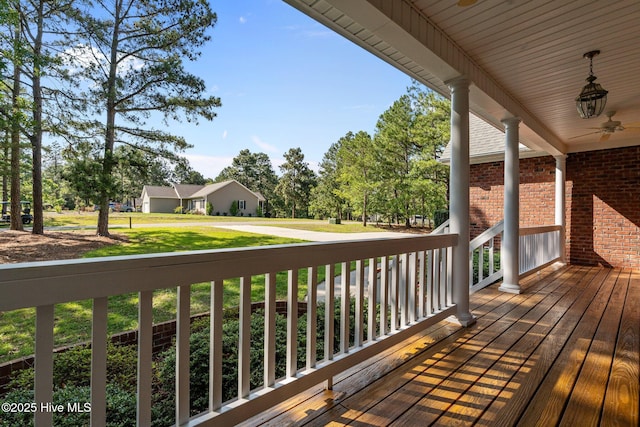 103 Sandspur Ln, West End, NC 27376 - wooden porch featuring ceiling fan