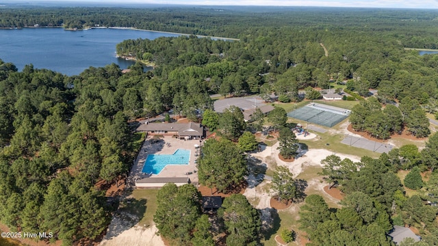 103 Sandspur Ln, West End, NC 27376 - aerial view of property and surrounding area with a forest, a nearby body of water, and a pool area