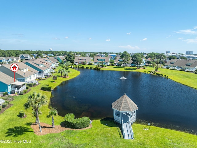 632 Settlers Ln, Kure Beach, NC 28449 - aerial perspective of suburban area featuring a nearby body of water