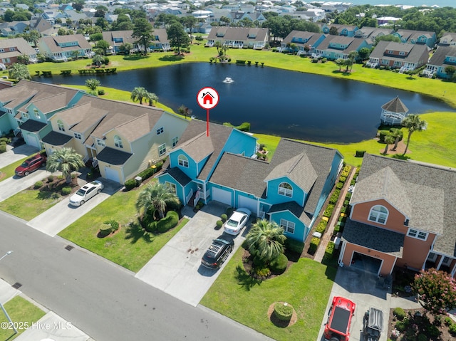 632 Settlers Ln, Kure Beach, NC 28449 - aerial perspective of suburban area featuring a large body of water