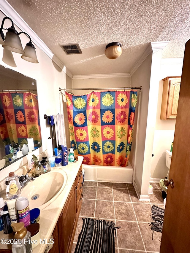 2513 David Ave, Kinston, NC 28501 - full bath featuring vanity, ornamental molding, tile patterned flooring, a textured ceiling, and baseboards
