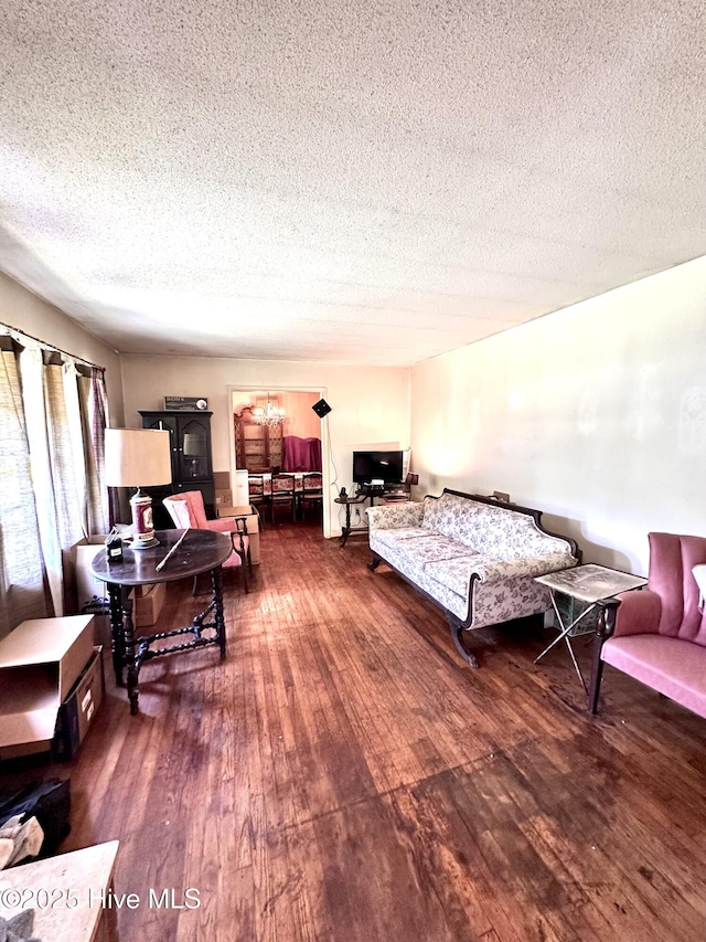 2513 David Ave, Kinston, NC 28501 - living area with a textured ceiling and hardwood / wood-style flooring