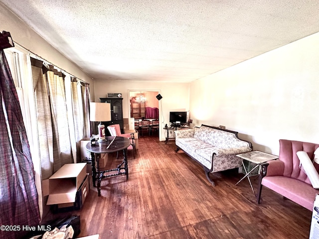 2513 David Ave, Kinston, NC 28501 - living area featuring a textured ceiling and wood finished floors