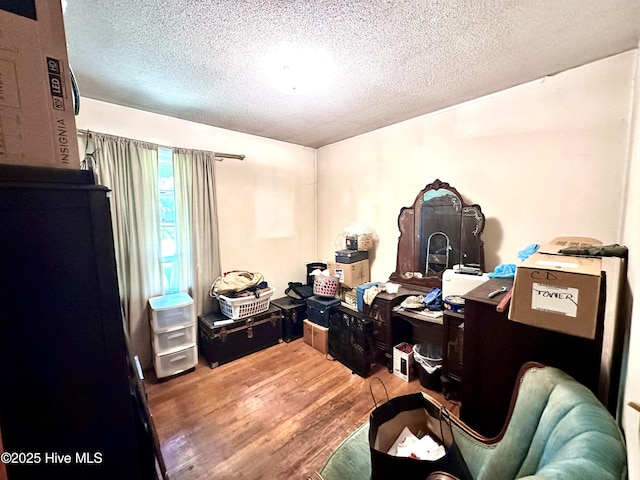 2513 David Ave, Kinston, NC 28501 - office area featuring a textured ceiling and wood finished floors
