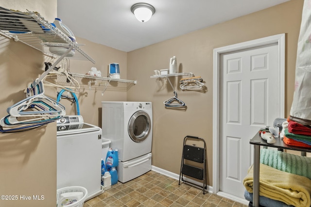40 Sedgefield Ln, Spring Lake, NC 28390 - washroom with washer and dryer, baseboards, and heating unit
