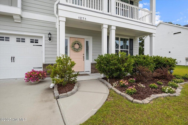 1233 Lt Congleton Rd, Wilmington, NC 28409 - entrance to property featuring a balcony, a porch, stone siding, and an attached garage