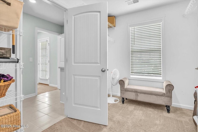 1233 Lt Congleton Rd, Wilmington, NC 28409 - sitting room with baseboards, light carpet, and light tile patterned floors