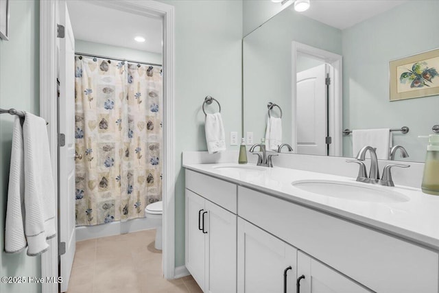 1233 Lt Congleton Rd, Wilmington, NC 28409 - full bath featuring toilet, double vanity, tile patterned flooring, and shower / bath combo with shower curtain
